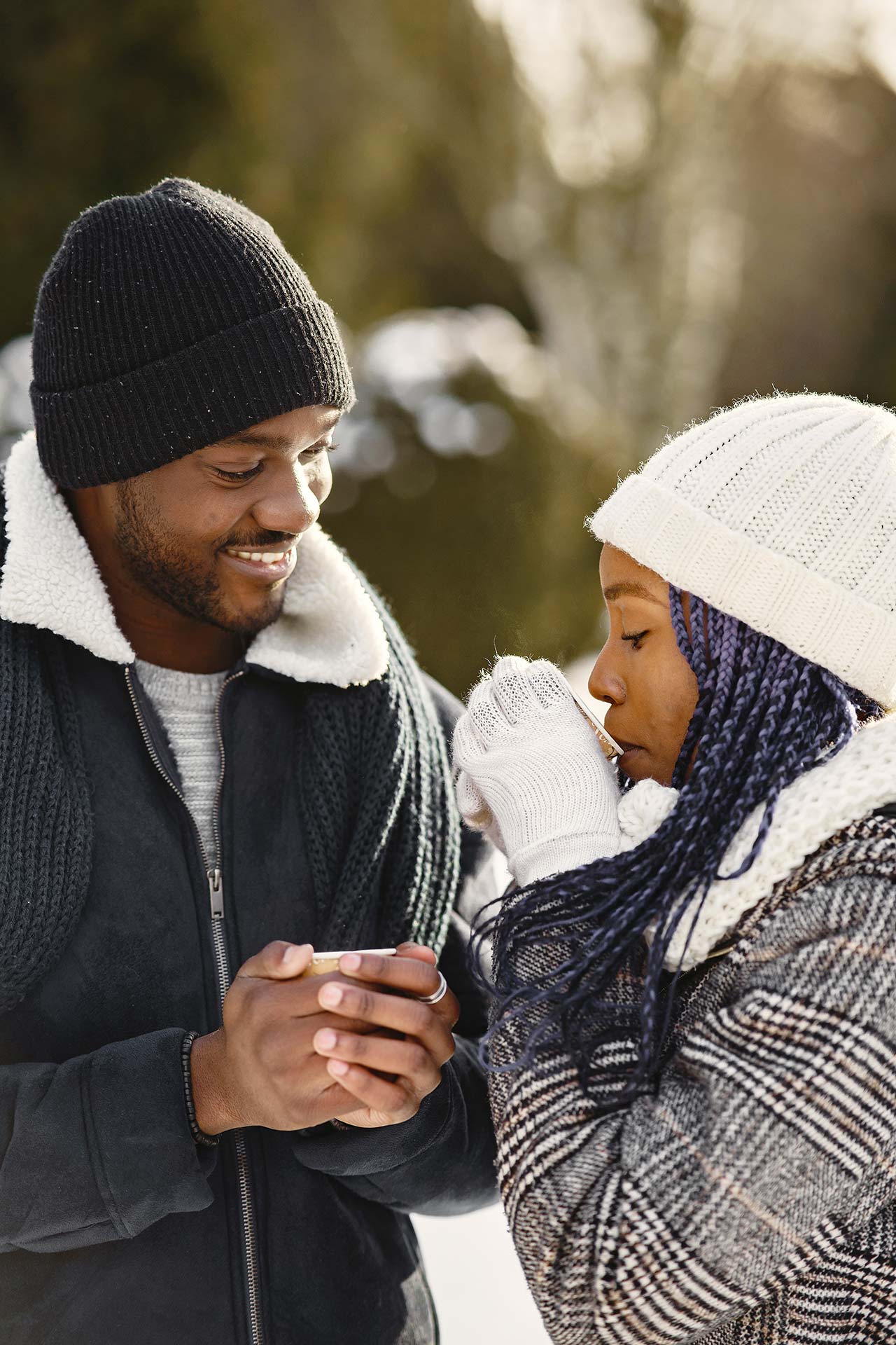 African American couple keeping warm