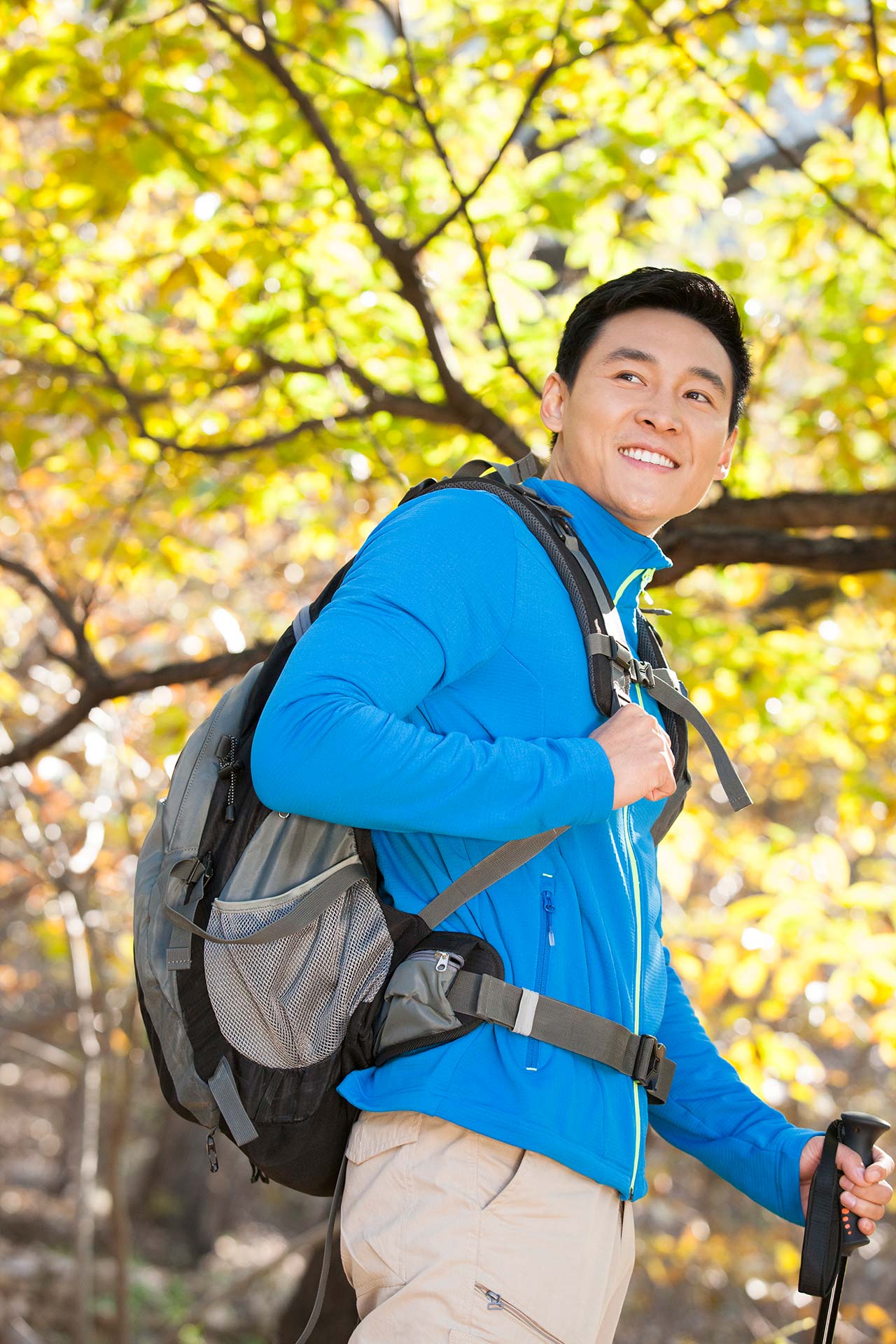 Young Asian man on a hike