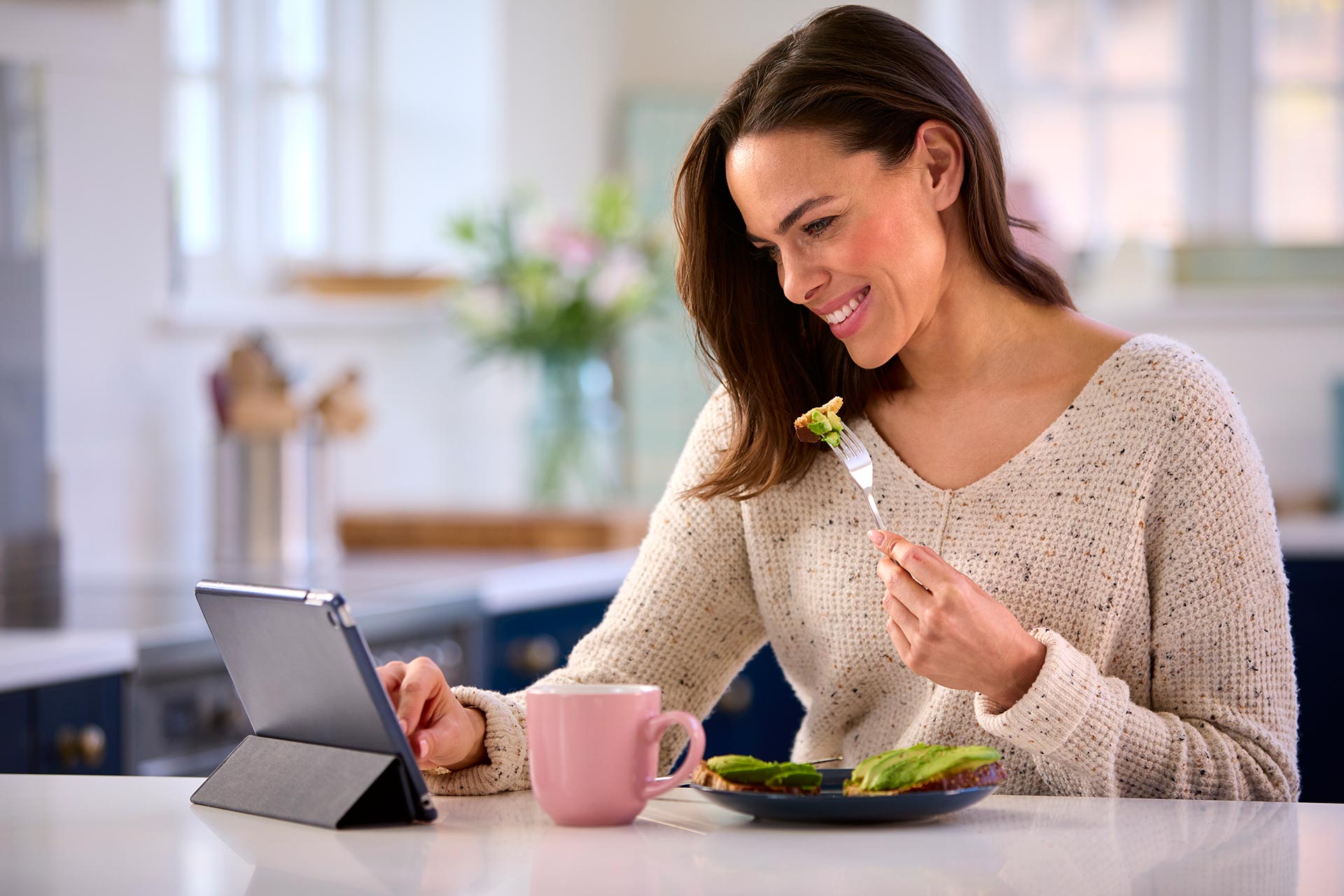Woman reading from tablet