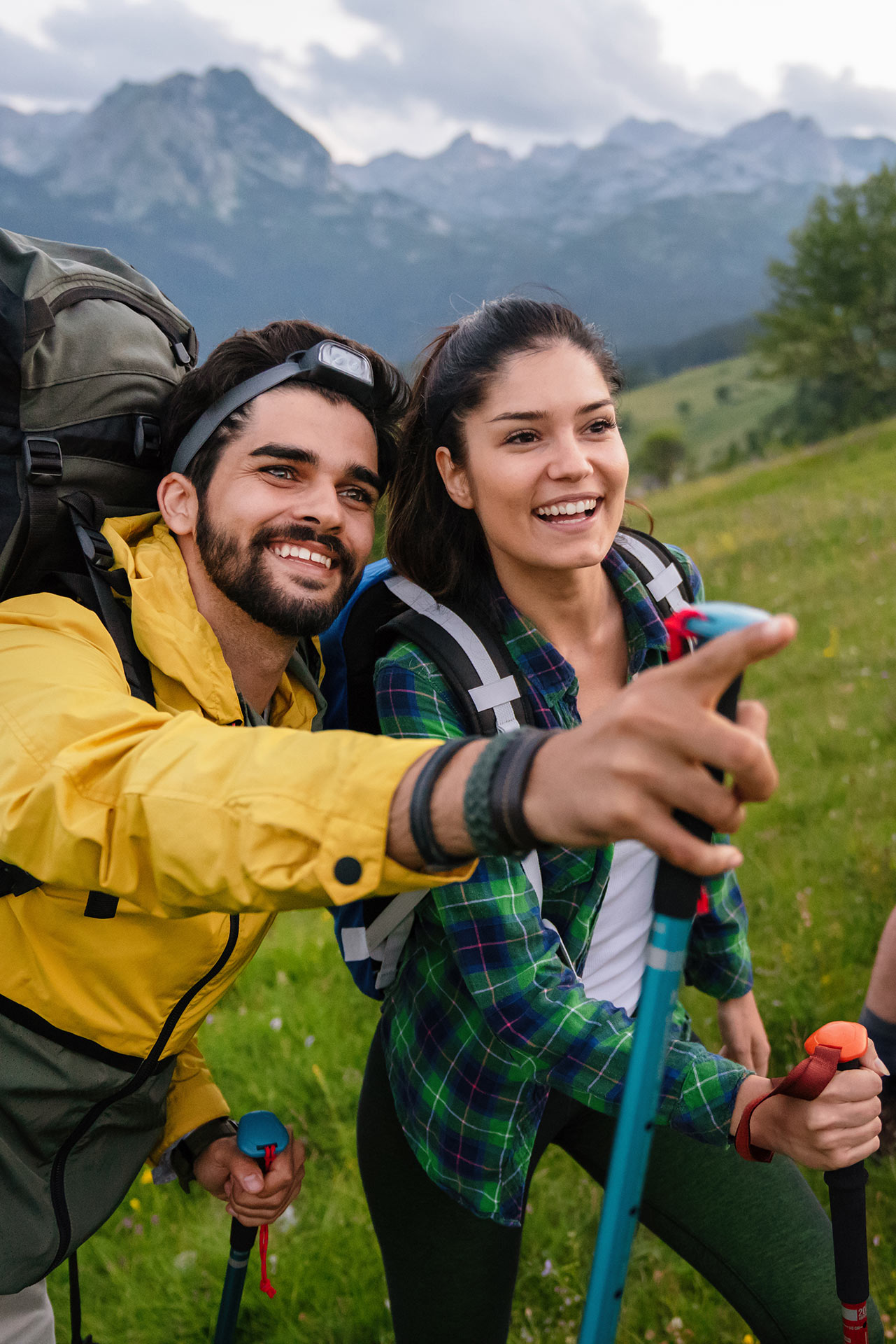 Couple hiking together in mountains